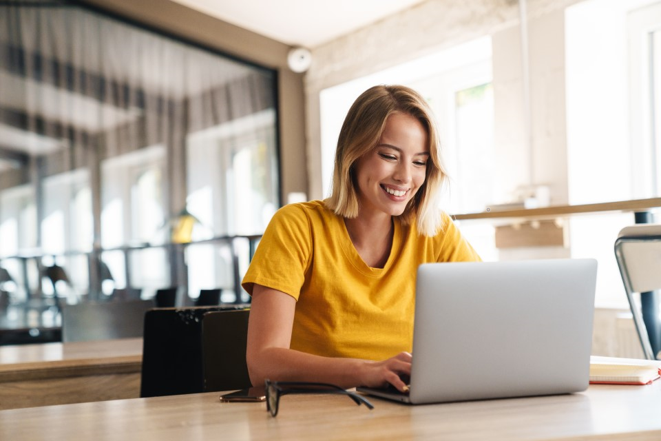 woman typing on computer